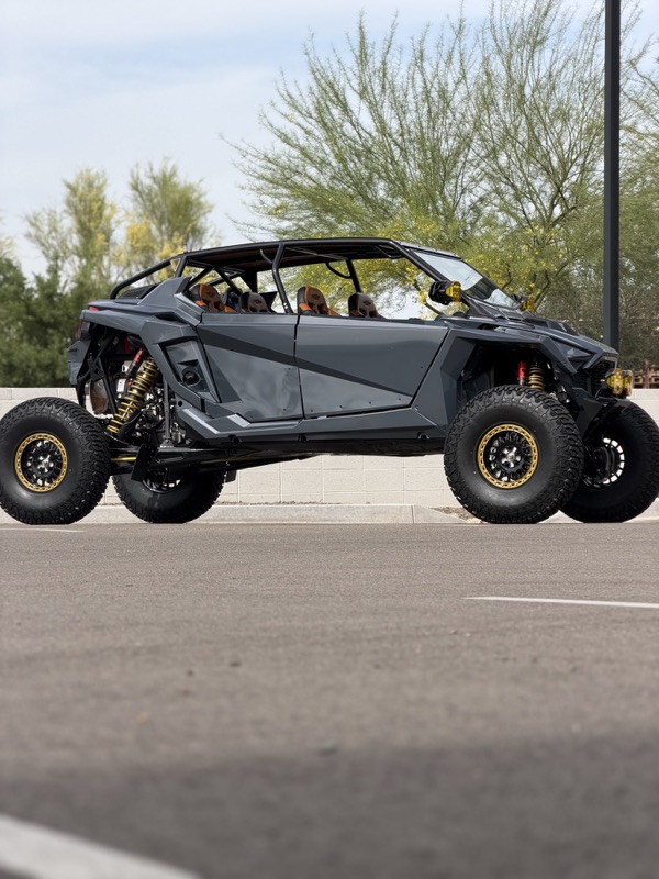 Gray Can-Am off-road build, side profile