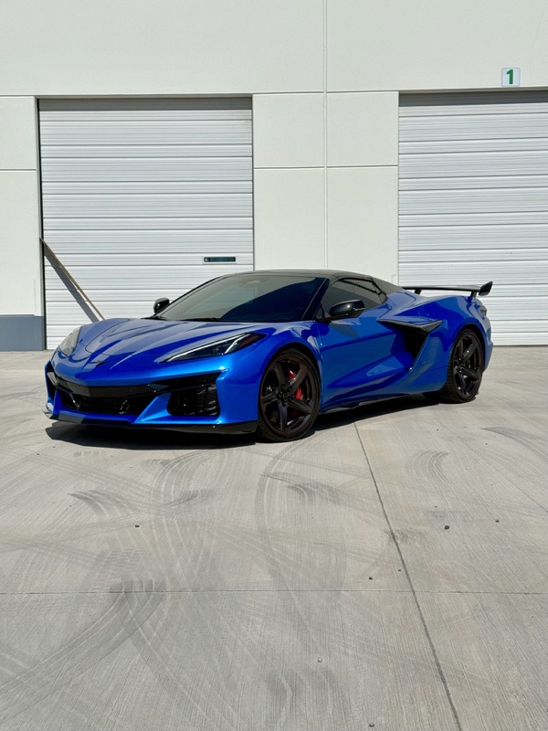 Blue Corvette Z06 in the shop bay