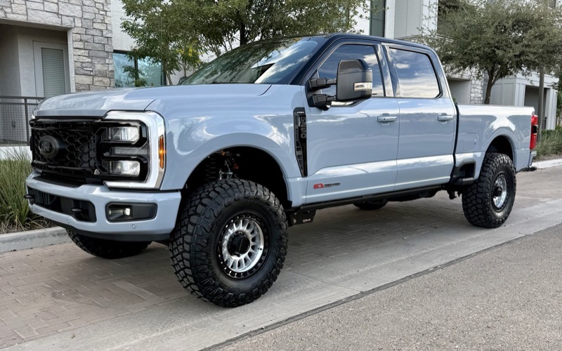 Lifted gray Ford F-250 customer build, side view
