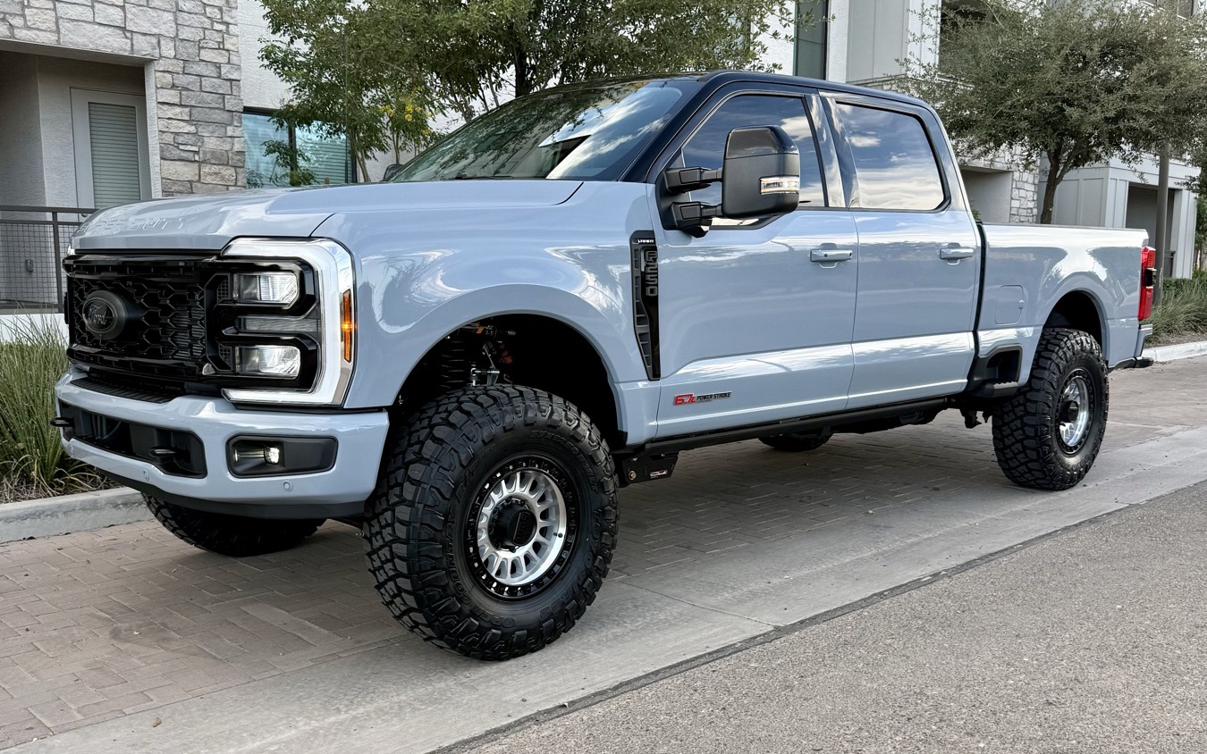 Lifted gray Ford F-250 customer build, side view